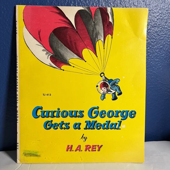 Curious George Gets a Medal Book - Picture 1 of 6